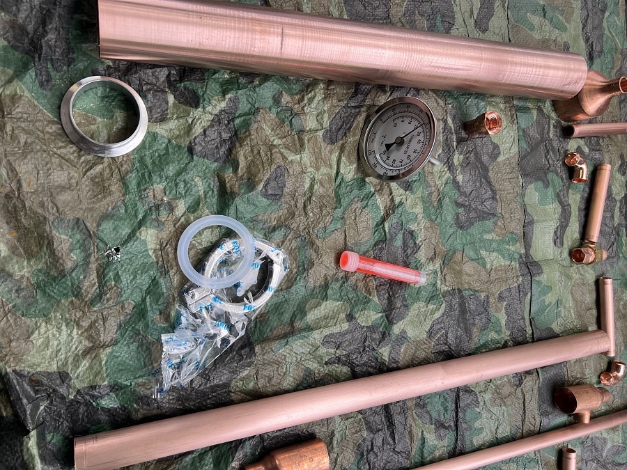 Parts needed to build a keg still.
