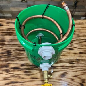 Inlet, outlet, and flow regulator in a 2-gallon bucket worm.