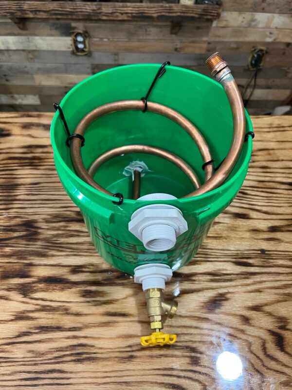 Inlet, outlet, and flow regulator in a 2-gallon bucket worm.