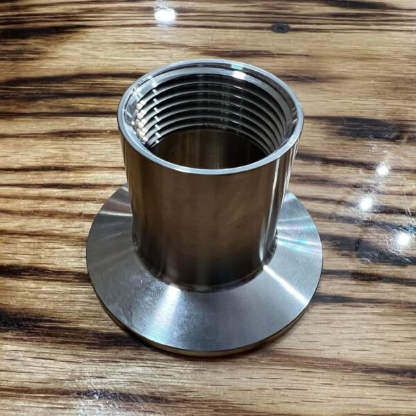 2-inch tri-fitting to 1-inch fnpt adapter.