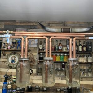 Three quarter inch copper mason jar thumper with bypass.