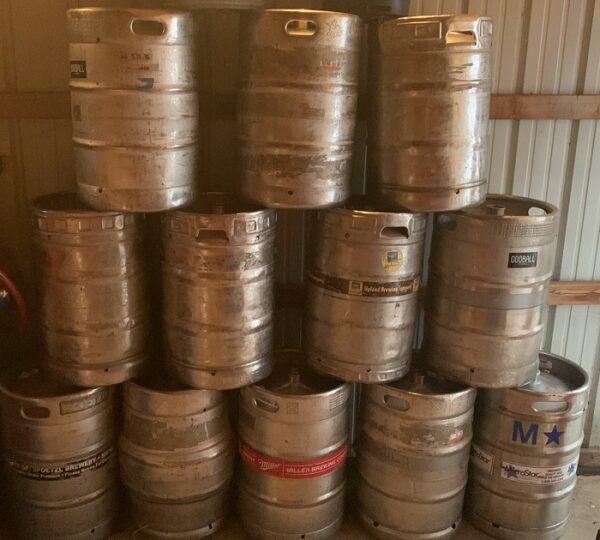 Stack of beer kegs for making keg stills.