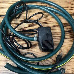 Pond pump and hoses for transferring mash, and cooling condensers.