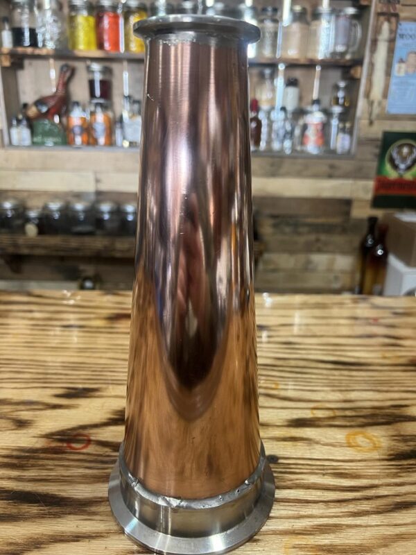 Polished copper reducer, 4 inch to 2 inch, 11 inches long.