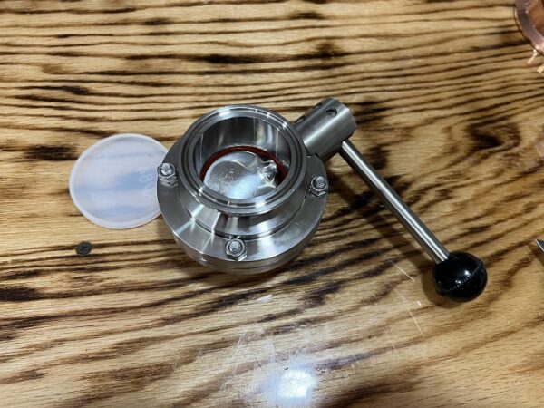 Tri fitting butterfly shut off valve for distilling.