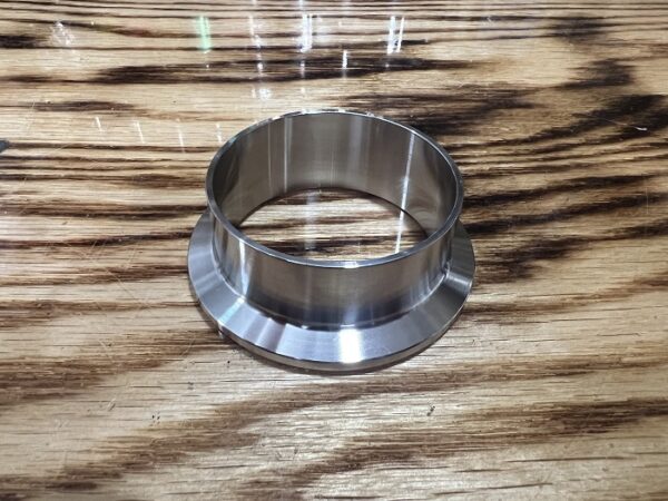 Stainless steel long weld tri clover ferrule.