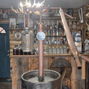 Two foot keg still with counter balance thumper jar.