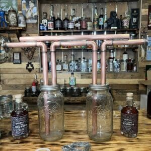 2 inch tri-clamp ferrule connection on a dual glass moonshine thumper.