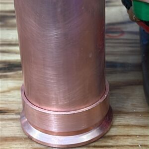 Custom-designed 2-inch copper outer sleeve ferrule seated flush onto a copper pipe for easy, professional soldering.