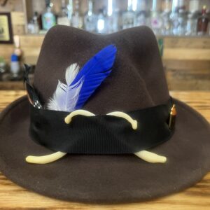 Rustic Popcorn style moonshiner hat with genuine raccoon baculum, black ribbon band, and natural feather arrangement.